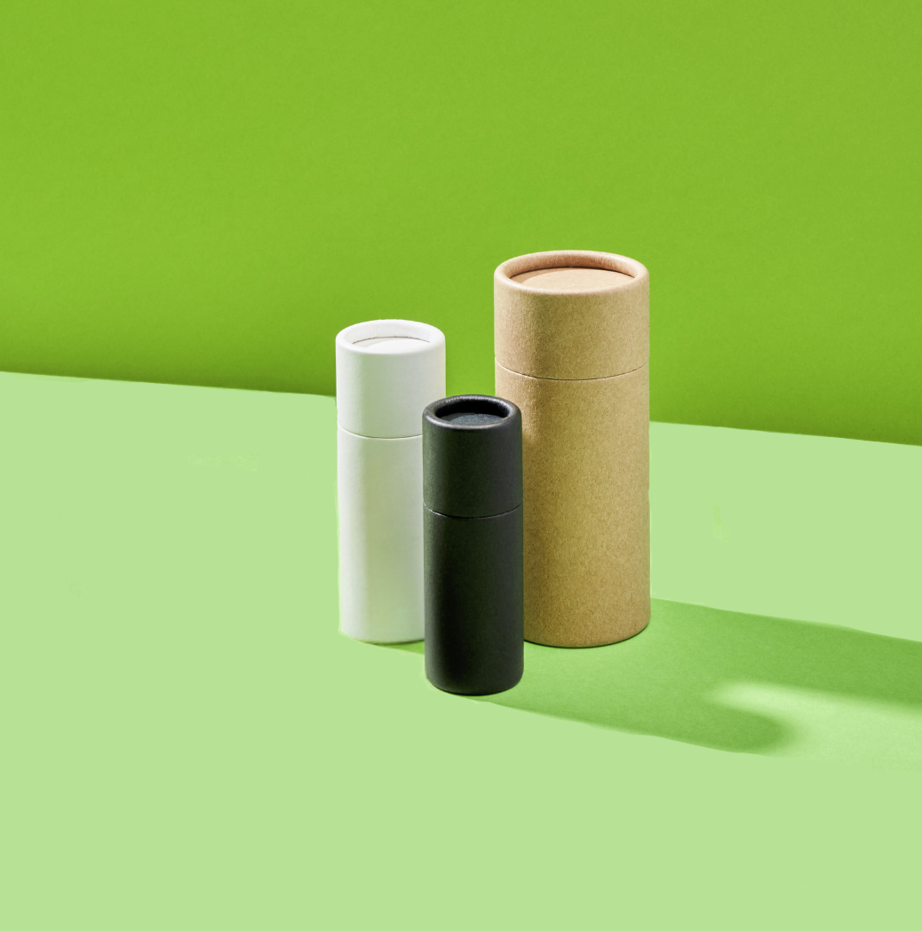 Collection of push-up base deodorant tubes in three colours.